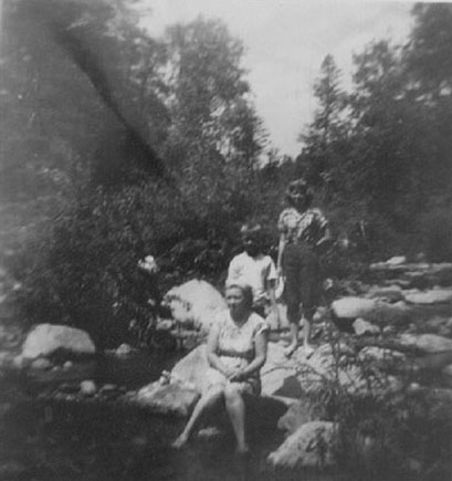 <johnie, terry and adrienne posed by mountain streem possible location northern new mexico Tres Ritos>