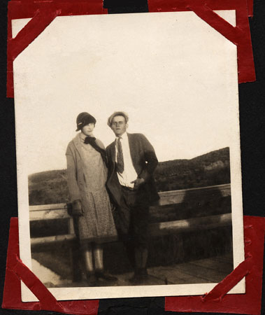 <Couple Standing on Bridge>