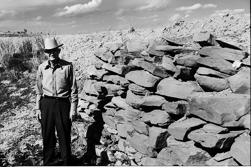 Adron standing by spillway ccc camp