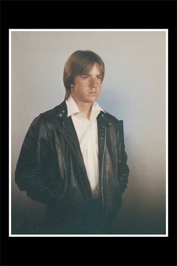 <ron turner high school senior photos black leather jacket>