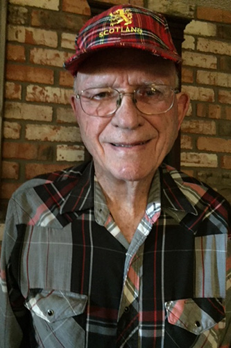 ben taylor wearing a plaid scotland cap